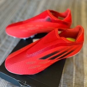 Boys slip on adidas cleats